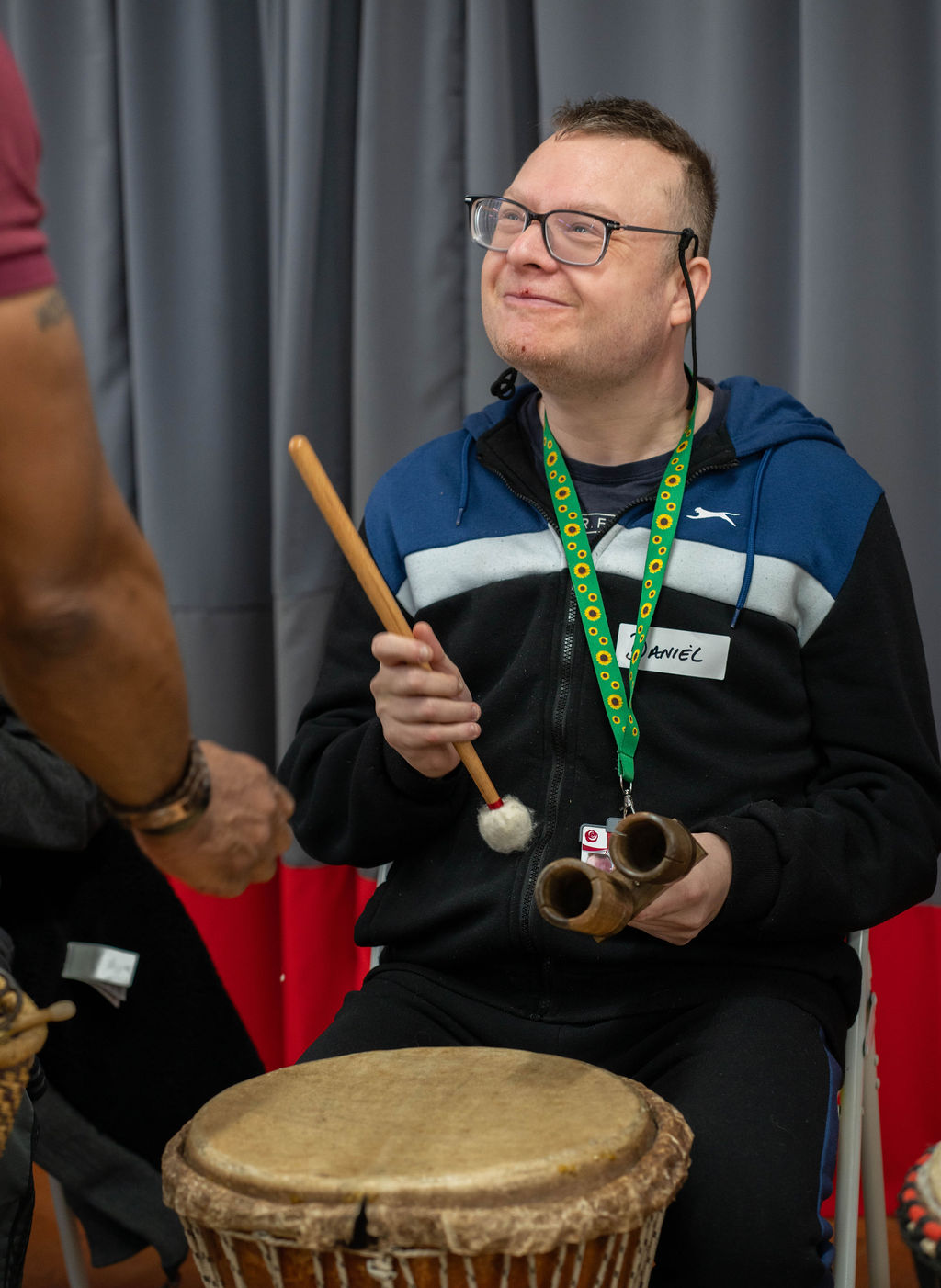 IMPACD CIC participant exploring drumming